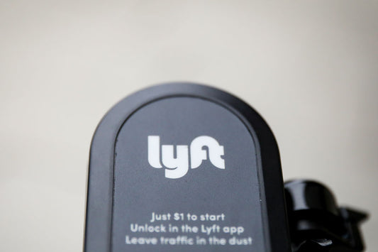 Lyft shares higher premarket despite paring back earlier gains on guidance error